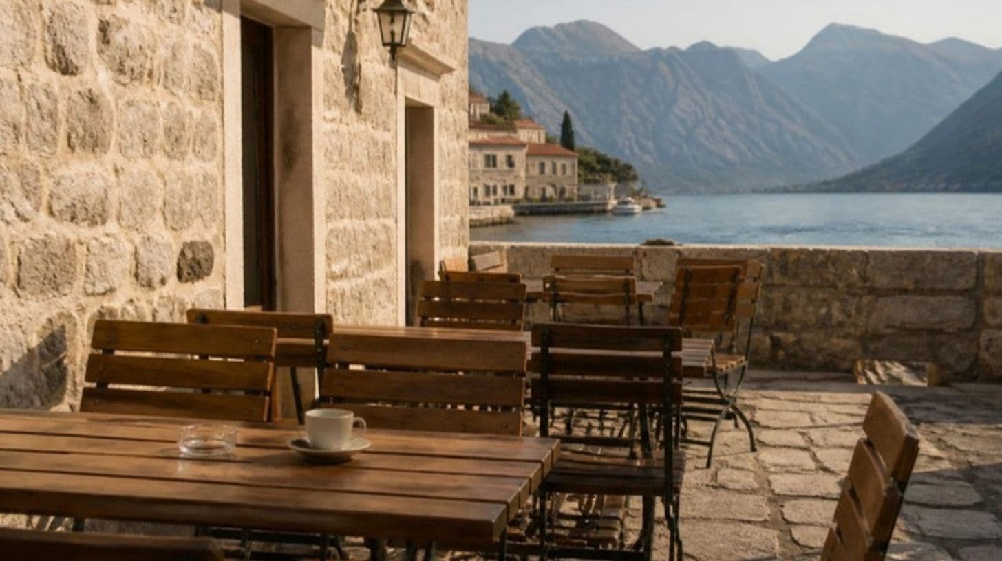 An empty open-air café terrace by the sea